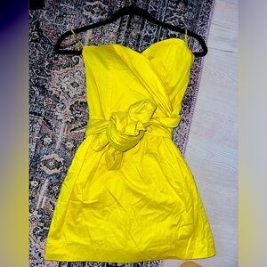 french connection yellow strapless wrap around tie romper dress
